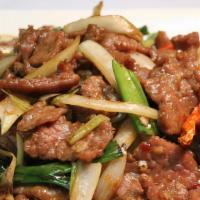 Mongolian Beef · Spicy. White onion and green onion.