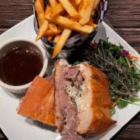 Prime Rib Sammich · our house roasted tender prime rib, heated in our cajun jus, dressed with garlic and creamy ...