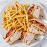 Clubhouse · Hand cut turkey on 3 layers of toasted white bread with mayo, tomatoes, lettuce and bacon.