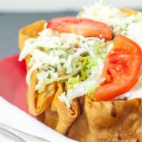 Veggie Taco Salad · Fried flour tortilla shell topped with rice, choice of beans (pinto, whole or black beans), ...