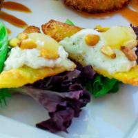Laura Chenel’s Warm Goat Cheese Wontons (4) · With Caramelized Apples and Pine Nuts on a Bed of Organic Mixed Greens