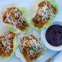 Lotus Chicken (Served With 4 Lettuce Cups) · Free Range Chicken Minced and Stir-Fried with Peanuts, Jicama, Carrots, Celery, Onions and S...