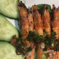 A3. Tôm Nướng Muối Ớt · Grilled shrimp with sate salt.