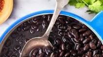 Black Beans · Served with mixed greens