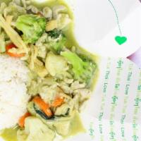 Green Curry · Medium spicy curry. Bamboo, zucchini, carrot, green bean, bell pepper, and basil in a savory...