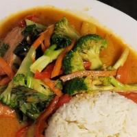 Red Curry · Spicy. Our most spicy curry. Bamboo, zucchini, carrot, green bean, bell pepper, and basil in...