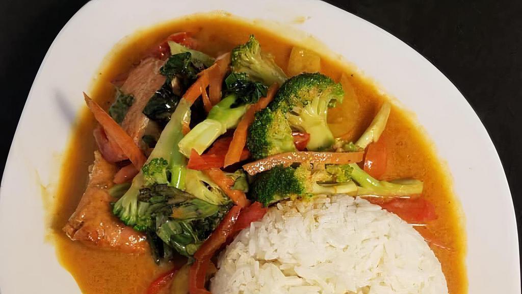 Red Curry · Spicy. Our most spicy curry. Bamboo, zucchini, carrot, green bean, bell pepper, and basil in a savory red curry sauce.