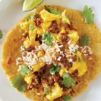 Breakfast Taco · Fresh Egg scrambled with house made chorizo, melted cheese, cilantro, cotija cheese, side of...