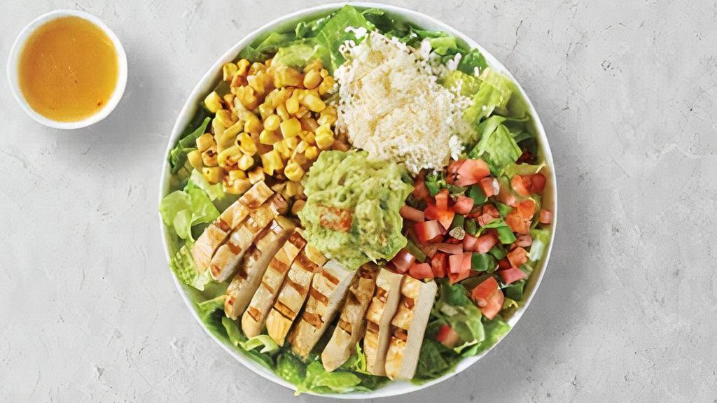 HTB Salad · Chopped romaine, guacamole, roasted corn, pico de gallo, cotija cheese, with mango vinaigrette or avocado verde on the side.