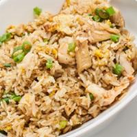 Chicken Fried Rice · With eggs. with scallions and side of hot sauce.