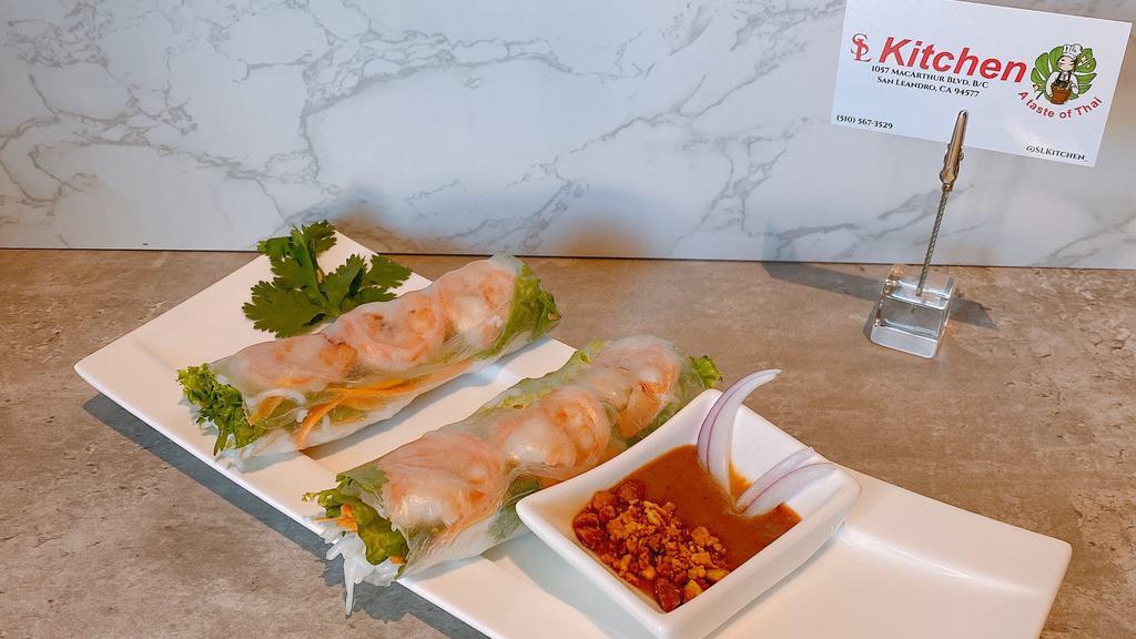 A5. Fresh Spring Rolls · Contains nuts. Lettuce wrapped with vermicelli, bean sprouts, fresh herbs, avocado, and choice of shrimp or tofu served with peanut sauce.