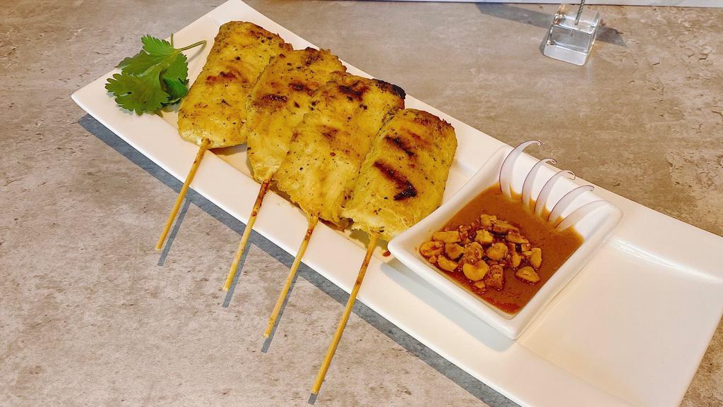 A9. Satay Beef or Chicken · Marinated and grilled served with spicy Lao style peanut sauce.