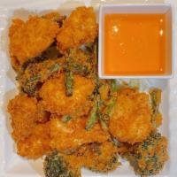 A10. Tempura Shrimp or Calamari · Battered and fried served with sweet and sour sauce.