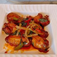 A11. Sweet & Sour Basil Wings · Double fried wings tossed in house sweet and sour sauce and basil.