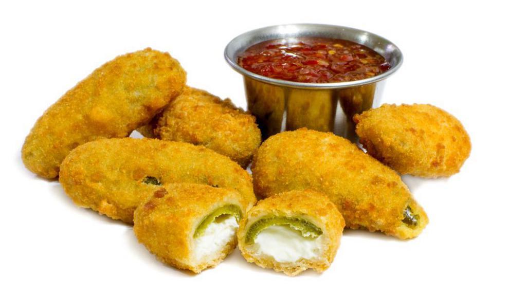 Cheddar Jalapeño Poppers · Jalapeños stuffed with cheese then crisped to perfection.