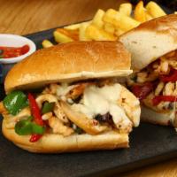 Chicken Cheesesteak Sandwich · Flavorful chicken, melted cheese, and grilled onions, served on a classic roll.