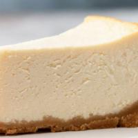 New York Cheesecake · Fresh baked cheesecake with a creamy filling and buttery crust.