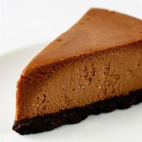 Chocolate New York Cheesecake · Fresh baked cheesecake with a creamy chocolate filling and buttery crust.