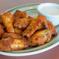 WINGS · HOW THE WEST WAS WON.  Bone in breaded wings with a mild tangy sauce is baked till a golden,...