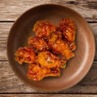 Sweet Chilli Wings · Classic wings fried and then tossed in our Sweet Chili Wings sauce.