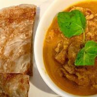 3. Parata (2 Pcs.) with Coconut chicken Curry · Multi-layered bread w/ lemongrass & coconut flavored Chicken curry