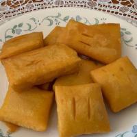 84.	Crispy Yellow Tofu (8 pcs) · Fried yellow tofu made of split peas w/ house sauce