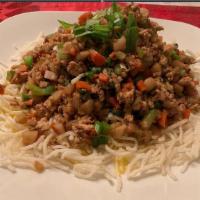 29.	Lettuce Chicken Wraps · Chicken, water chestnuts, onion, garlic, ginger & crispy rice noodle