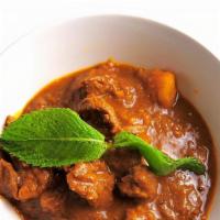 41. Shwe Myanmar Special Beef & Potatoes Curry · Braised tender beef with potatoes in Burmese spices.