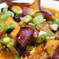 103. Spicy Eggplant · Sautéed eggplant w/ garlic, ginger,  scallion & chili bean paste