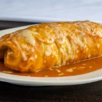 Enchirito Burrito · Your choice of meat; includes rice, beans, cheese, sour cream and salsa( pico de gallo) on a...