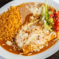 Two Enchiladas · Your choice of TWO cheese, chicken or beef enchiladas covered with our signature sauce. Serv...
