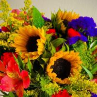 Seasonal Flowers · Wrapped mixed fresh seasonal flowers. Choose from pastel or bright colored or white flowers....