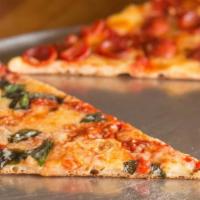 Margherita · Plum tomato sauce, olive oil, fresh basil and a blend of Italian cheeses.