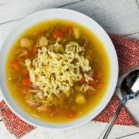Grandma Mary's Chicken Soup · A flavorful, soothing broth full of hand pulled chicken, parsnips, carrots, celery and egg n...