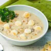 New England Clam Chowder · A thick, rich and creamy traditional recipe loaded with clams from the north Atlantic and re...
