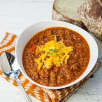 Turkey Chili · A thick chili made with ground turkey, tomatoes, red bell peppers and kidney beans simmered ...