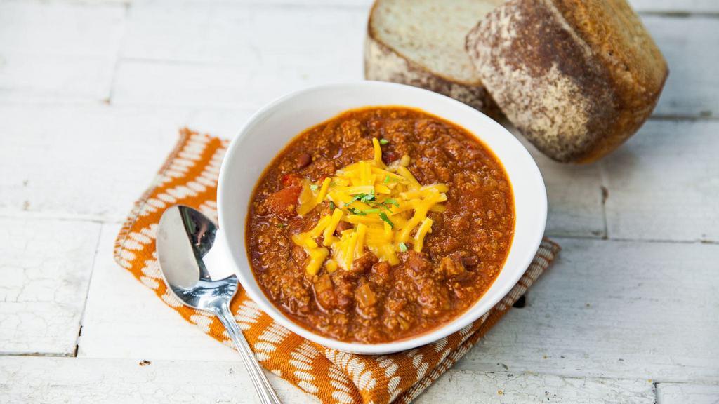 Turkey Chili · A thick chili made with ground turkey, tomatoes, red bell peppers and kidney beans simmered with ancho chiles. Garnished with Monterey Jack cheese. Lowfat, gluten free.
