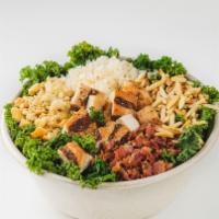 Chicken Bacon Kale Salad · Massaged kale, Mary's free-range chicken, uncured bacon, toasted almonds, breadcrumbs and ag...