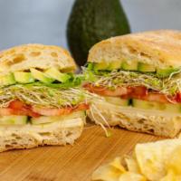 Avocado Pepper Jack · Avocado, pepper jack, romaine, sprouts, English cucumbers & tomatoes brushed with meyer lemo...
