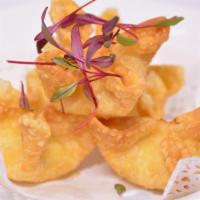 Crab Rangoon 蟹角 · Imitation crab, cream cheese and green onions wrapped in wonton skin and deep fried. Served ...