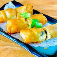 Vegetarian Egg Rolls 春卷 · Chopped up carrots, cabbage, bamboo shoot and black fungus wrapped in egg roll skin and deep...