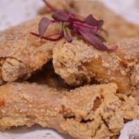 Fried Chicken Wings 炸雞翅 · Deep fried chicken wings lightly salted and peppered. Served with sweet and sour sauce. Non-...