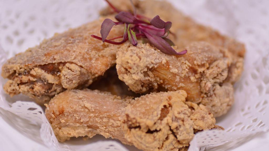 Fried Chicken Wings 炸雞翅 · Deep fried chicken wings lightly salted and peppered. Served with sweet and sour sauce. Non-spicy. 5 wings per order