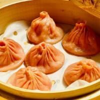Ma La XLB 麻辣小籠包 · 5 pieces of minced pork meat marinated in Sichuan peppercorn and chili pepper filled with so...