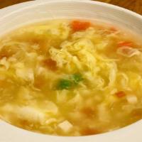Large Chicken Corn Soup 大雞茸玉米湯 · Minced chicken, eggs, peas and carrots cooked in chicken broth. Non-spicy.