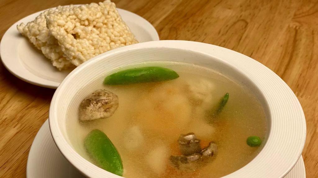 Large Sizzling Rice Soup 大鍋巴湯 · Prawns, white meat chicken, mushrooms and snap peas cooked in chicken broth. Served with crispy rice crackers. Non-spicy.