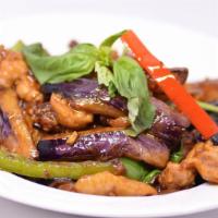 Basil Chicken 香菜雞 · Dark meat chicken stir-fried with Italian basil, bell peppers, mushrooms and snap peas. Spicy.