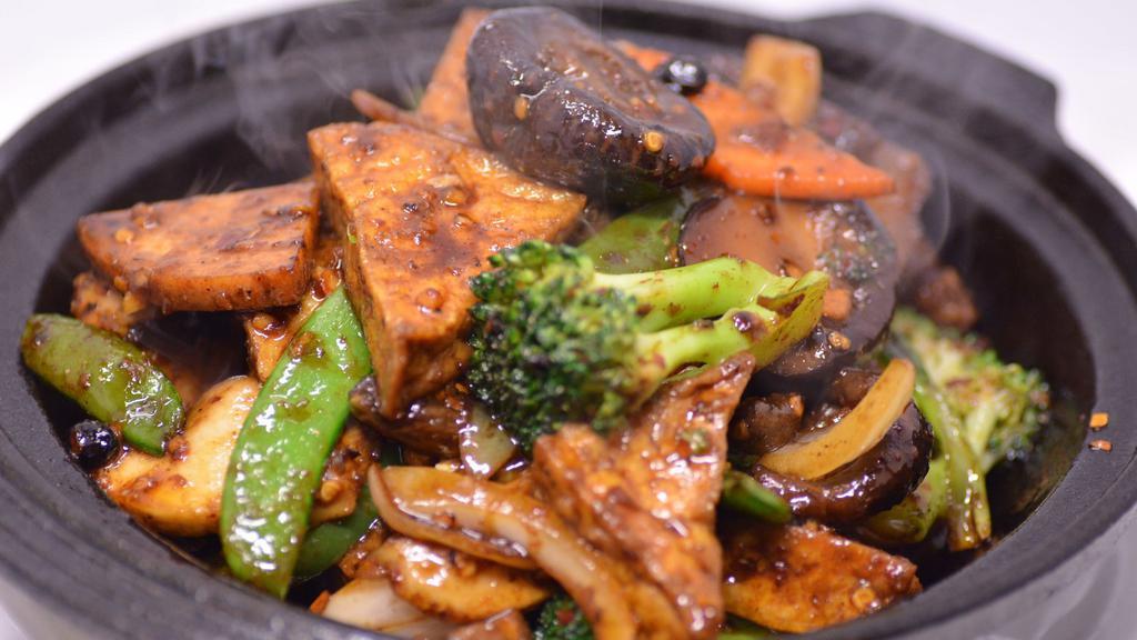 Sichuan Lohan 四川羅漢 · Stir-fried vegetables with meatless chicken, fried tofu, and peppercorn sauce. Spicy