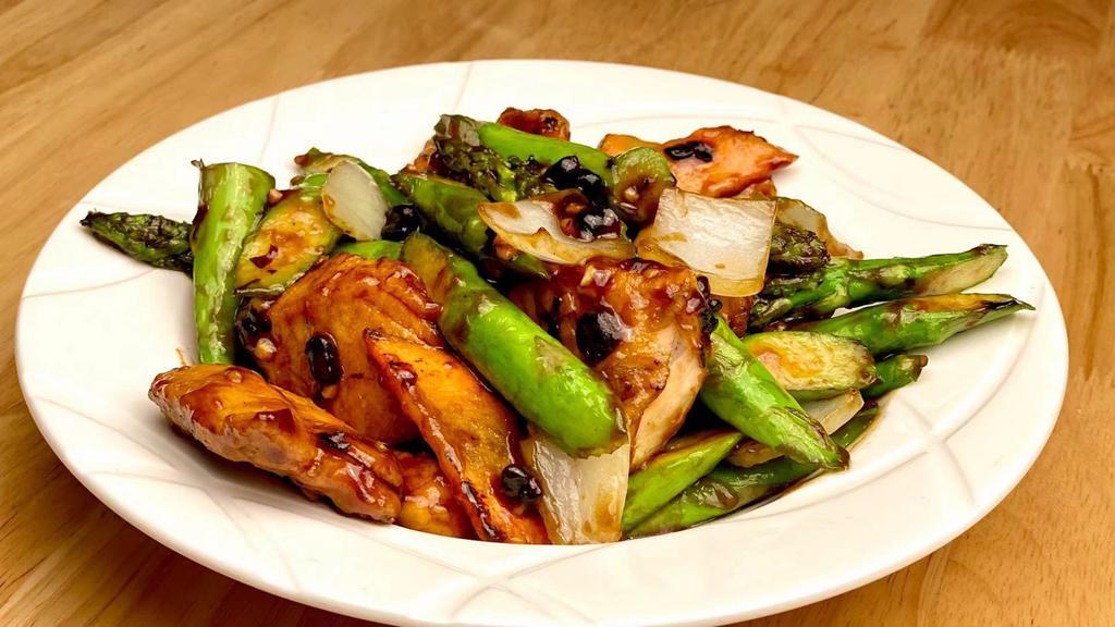 King Salmon & Asparagus 利筍三文 · Pan-fried salmon and asparagus mixed in our delicious black bean sauce. Non-spicy.