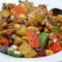 Kung Pao Chicken 宮保雞 · Dark meat chicken stir-fried with bell peppers, chili peppers and peanuts in our delicious b...